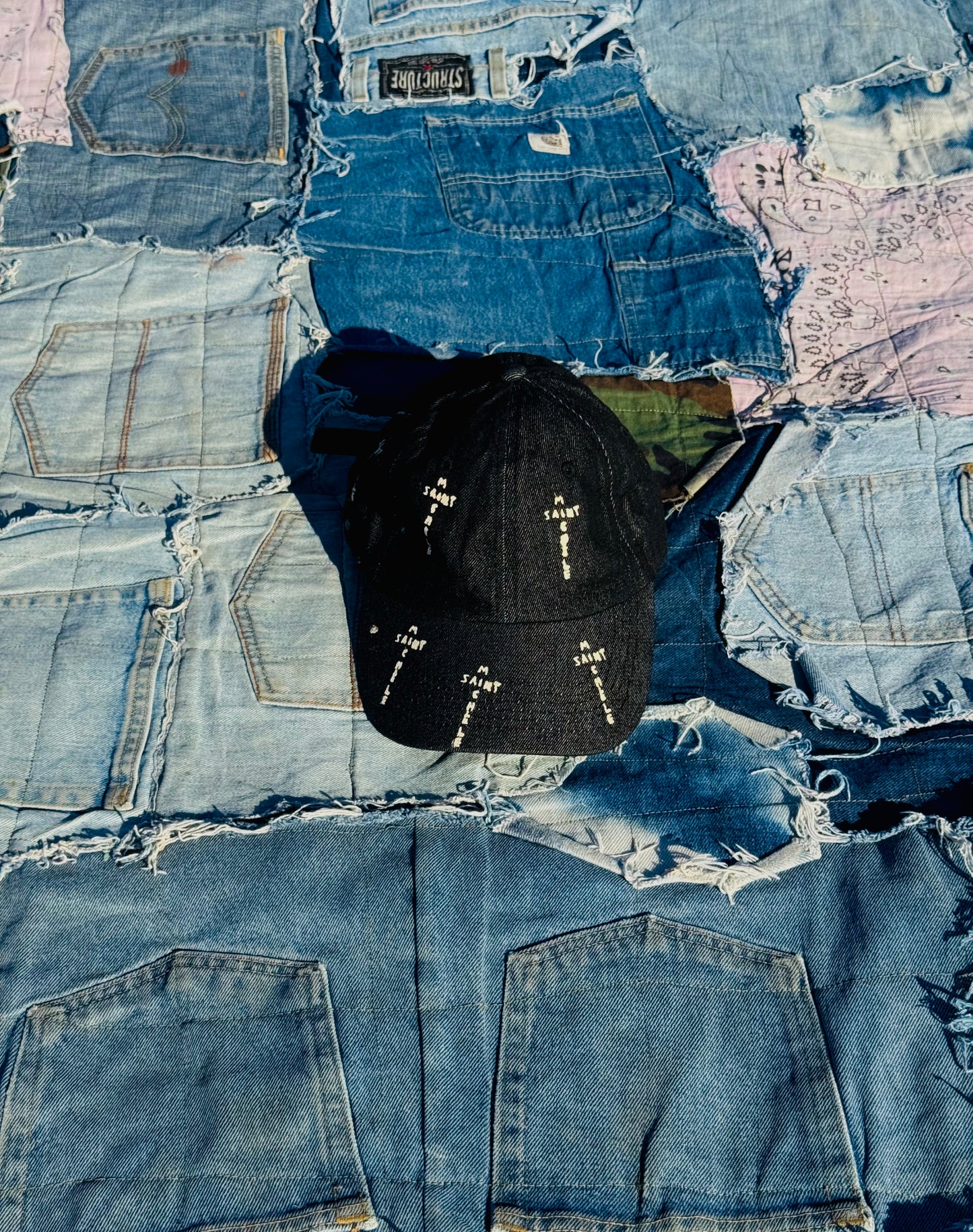 MONOGRAM CROSS LOGO TRUCKER | BLACK RAW DENIM