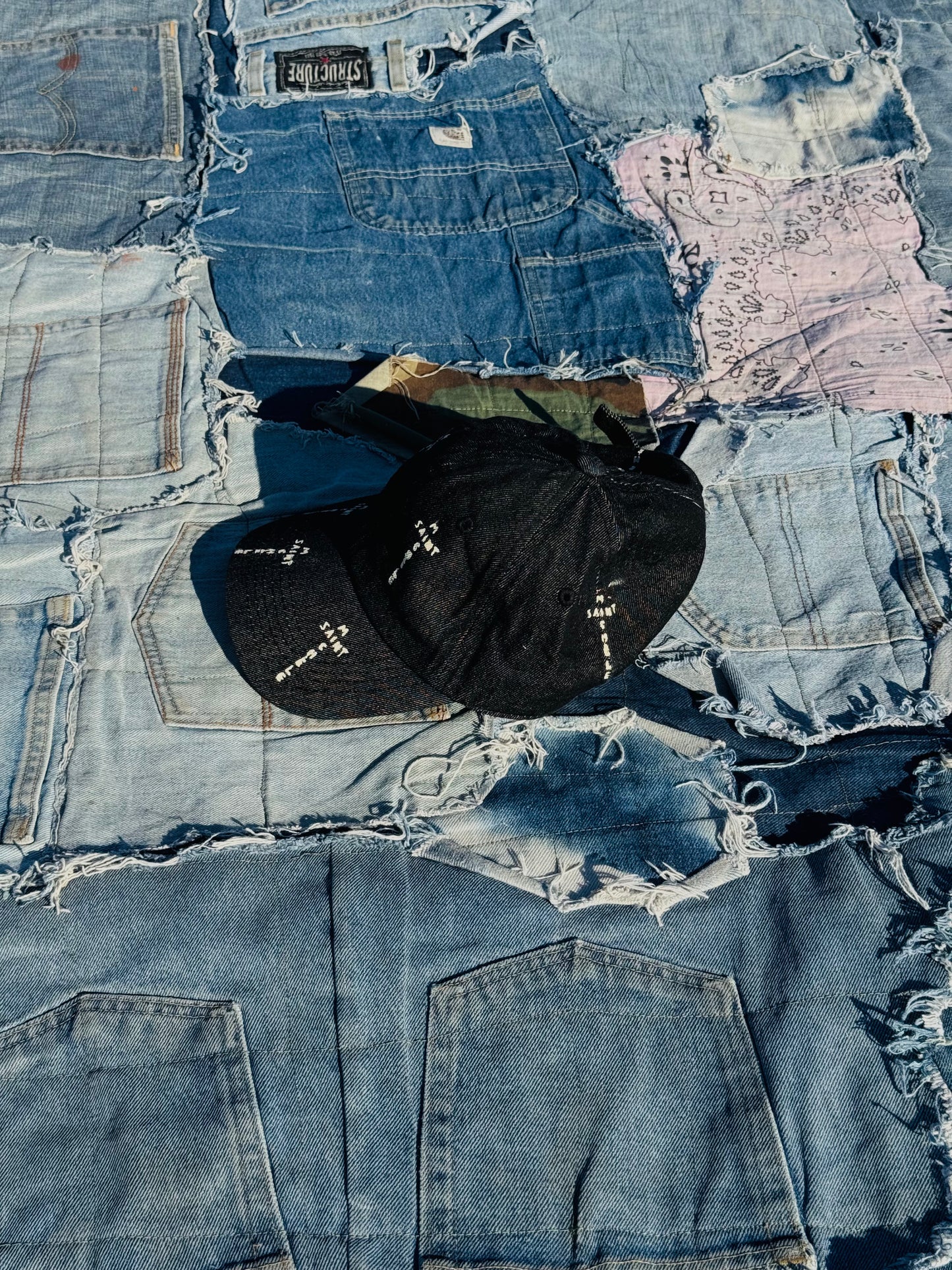 MONOGRAM CROSS LOGO TRUCKER | BLACK RAW DENIM