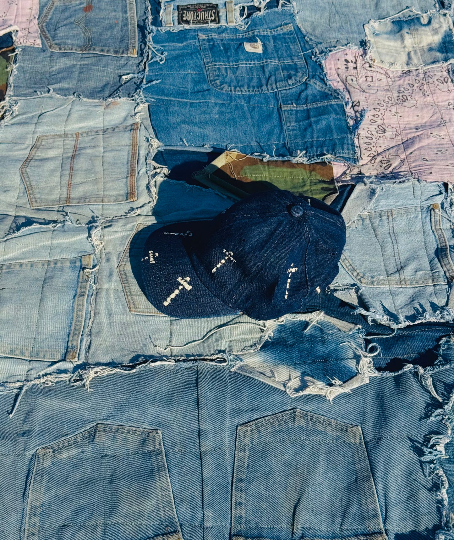 MONOGRAM CROSS LOGO TRUCKER | RAW DENIM